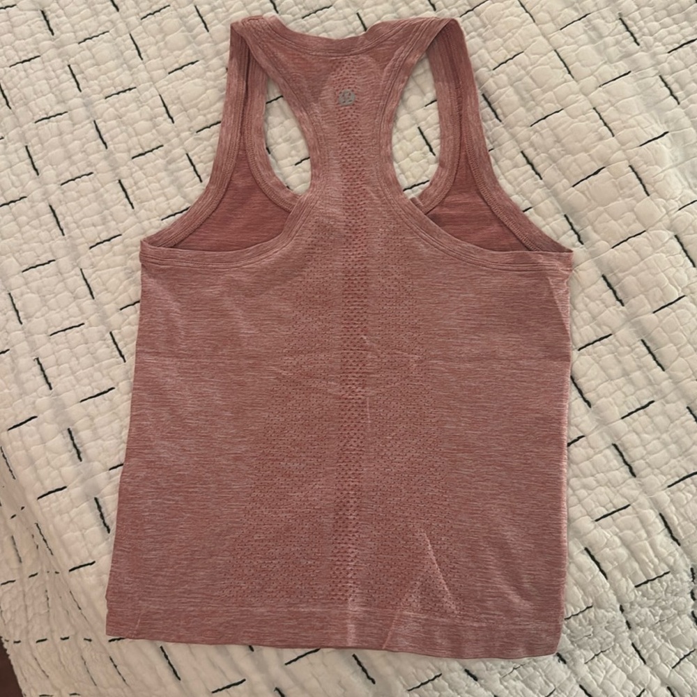 Lululemon racerback tank in light Heather pink size 2.